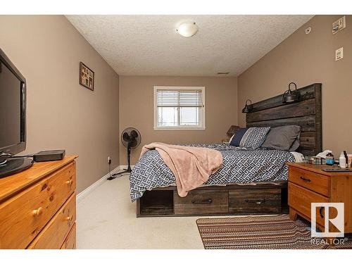 304 5204 52 Avenue, Tofield, AB - Indoor Photo Showing Bedroom