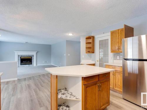 1510 Wellwood Way, Edmonton, AB - Indoor Photo Showing Other Room With Fireplace