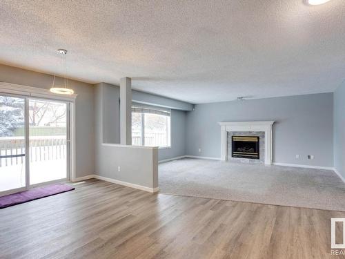 1510 Wellwood Way, Edmonton, AB - Indoor Photo Showing Living Room With Fireplace