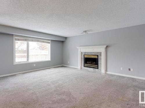 1510 Wellwood Way, Edmonton, AB - Indoor Photo Showing Living Room With Fireplace