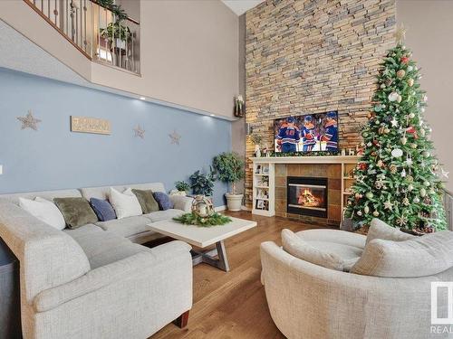 9 Huntington Drive, Spruce Grove, AB - Indoor Photo Showing Living Room With Fireplace