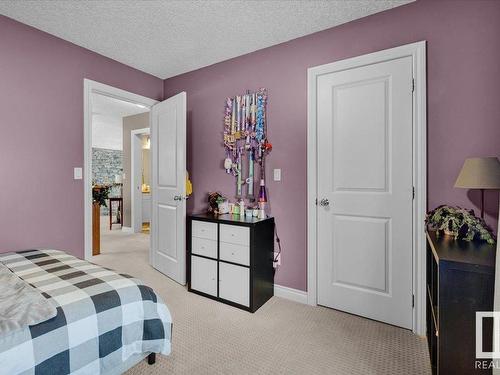 9 Huntington Drive, Spruce Grove, AB - Indoor Photo Showing Bedroom