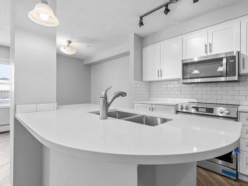 106 636 Mcallister Loop, Edmonton, AB - Indoor Photo Showing Kitchen With Double Sink With Upgraded Kitchen