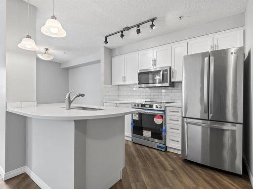 106 636 Mcallister Loop, Edmonton, AB - Indoor Photo Showing Kitchen With Upgraded Kitchen