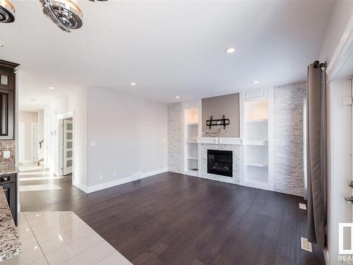 16231 138 St Nw, Edmonton, AB - Indoor Photo Showing Living Room With Fireplace