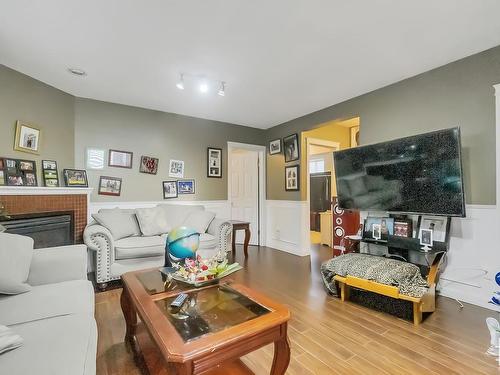 51 Durocher Street, St. Albert, AB - Indoor Photo Showing Living Room With Fireplace