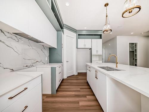 22 Meadowlink Point(E), Spruce Grove, AB - Indoor Photo Showing Kitchen With Double Sink