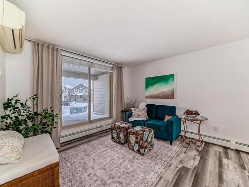 109 270 Mcconachie Drive, Edmonton, AB - Indoor Photo Showing Living Room