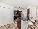 109 270 Mcconachie Drive, Edmonton, AB  - Indoor Photo Showing Kitchen With Stainless Steel Kitchen With Double Sink 