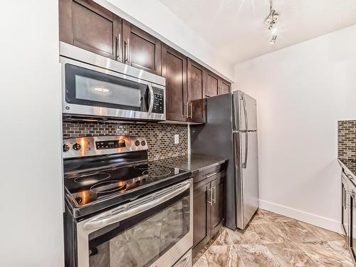 109 270 Mcconachie Drive, Edmonton, AB - Indoor Photo Showing Kitchen With Stainless Steel Kitchen