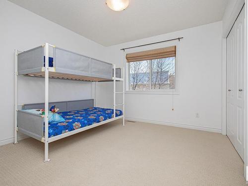 127 89 Rue Monette, Beaumont, AB - Indoor Photo Showing Bedroom