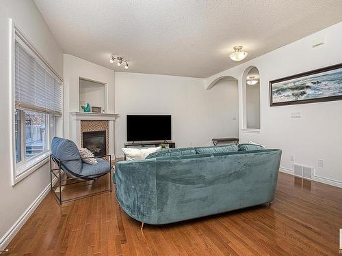 127 89 Rue Monette, Beaumont, AB - Indoor With Fireplace