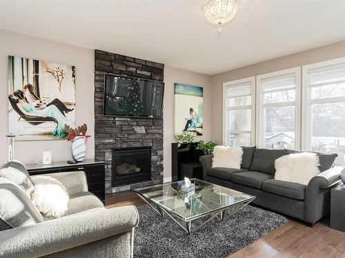 2307 Warry Court, Edmonton, AB - Indoor Photo Showing Living Room With Fireplace