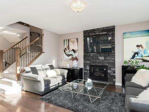 2307 Warry Court, Edmonton, AB - Indoor Photo Showing Living Room With Fireplace