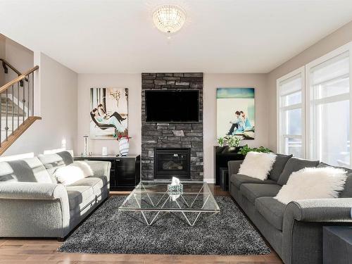 2307 Warry Court, Edmonton, AB - Indoor Photo Showing Living Room With Fireplace