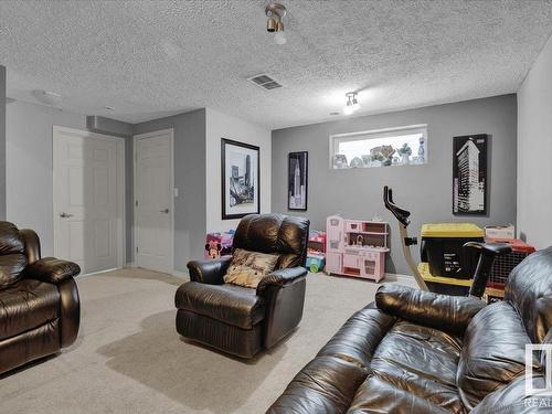 89 Keystone Crescent, Leduc, AB - Indoor Photo Showing Living Room