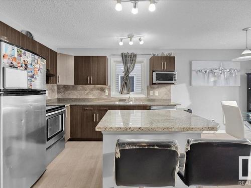 89 Keystone Crescent, Leduc, AB - Indoor Photo Showing Kitchen With Upgraded Kitchen