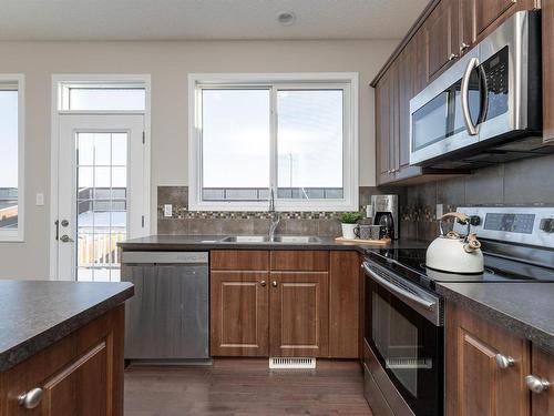 205 Sturtz Bend, Leduc, AB - Indoor Photo Showing Kitchen With Double Sink