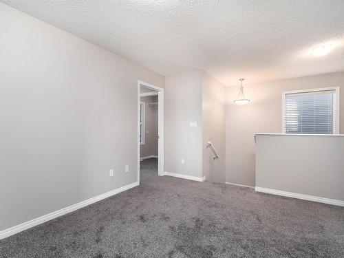 205 Sturtz Bend, Leduc, AB - Indoor Photo Showing Other Room