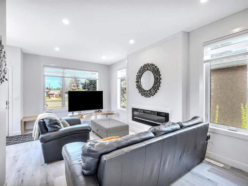 11345 111 Avenue, Edmonton, AB - Indoor Photo Showing Living Room With Fireplace