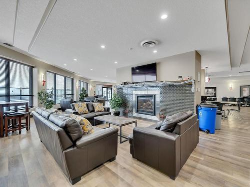 259 7805 71 Street, Edmonton, AB - Indoor Photo Showing Living Room With Fireplace