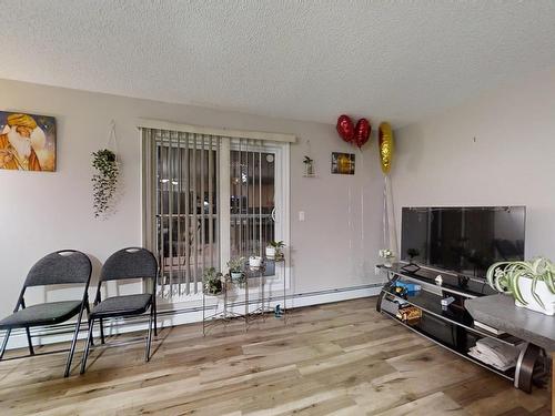 104 4407 23 Street Nw, Edmonton, AB - Indoor Photo Showing Living Room