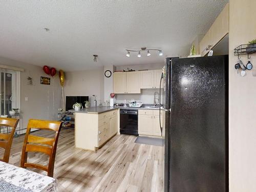 104 4407 23 Street Nw, Edmonton, AB - Indoor Photo Showing Kitchen