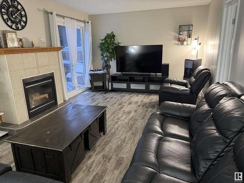 461 Dunluce Road, Edmonton, AB - Indoor Photo Showing Living Room With Fireplace