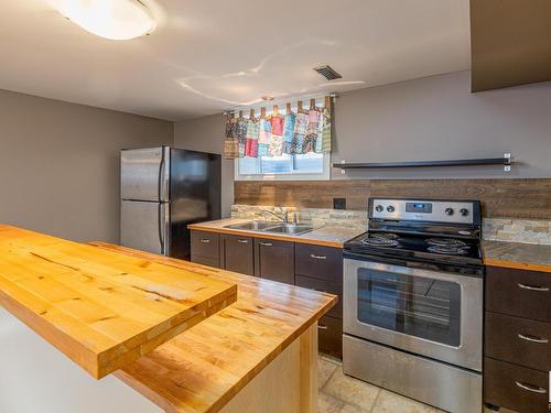 12305 106 Street, Edmonton, AB - Indoor Photo Showing Kitchen With Double Sink