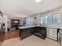 27 52212 Rge Road 274 Nw, Rural Parkland County, AB  - Indoor Photo Showing Kitchen With Double Sink 