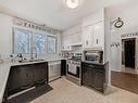 27 52212 Rge Road 274 Nw, Rural Parkland County, AB  - Indoor Photo Showing Kitchen With Double Sink 