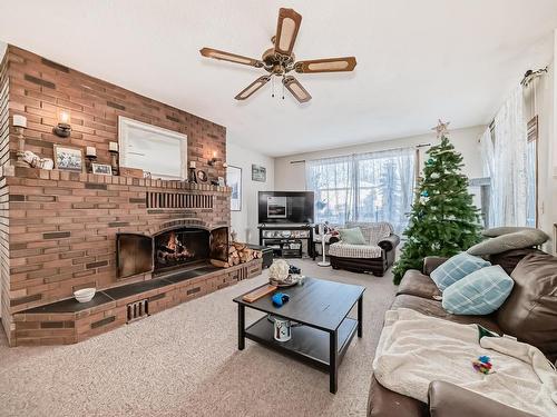 27 52212 Rge Road 274 Nw, Rural Parkland County, AB - Indoor Photo Showing Living Room With Fireplace