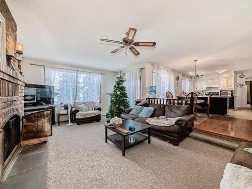 27 52212 Rge Road 274 Nw, Rural Parkland County, AB - Indoor Photo Showing Living Room With Fireplace