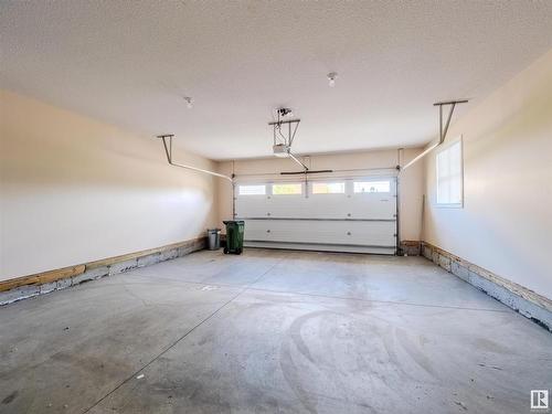 49 18343 Lessard Road, Edmonton, AB - Indoor Photo Showing Garage