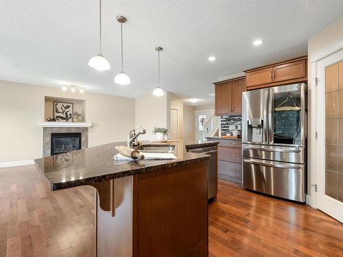 3231 Whitelaw Drive, Edmonton, AB - Indoor Photo Showing Kitchen With Fireplace With Double Sink With Upgraded Kitchen