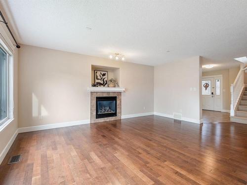 3231 Whitelaw Drive, Edmonton, AB - Indoor Photo Showing Living Room With Fireplace