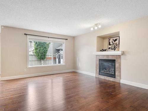 3231 Whitelaw Drive, Edmonton, AB - Indoor Photo Showing Living Room With Fireplace