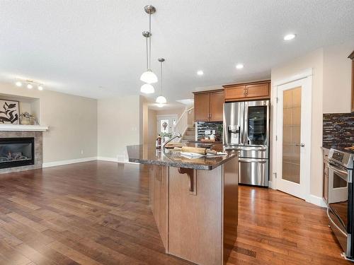 3231 Whitelaw Drive, Edmonton, AB - Indoor Photo Showing Kitchen With Fireplace With Upgraded Kitchen