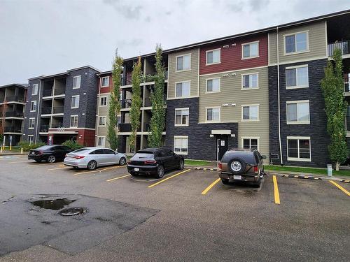 210 1080 Mcconachie Boulevard, Edmonton, AB - Outdoor With Balcony With Facade