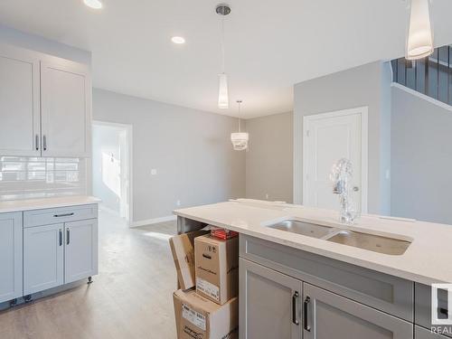 7127 52 Avenue, Beaumont, AB - Indoor Photo Showing Kitchen With Double Sink