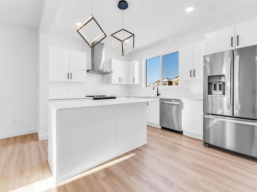 1224 14 Avenue Nw, Edmonton, AB - Indoor Photo Showing Kitchen With Stainless Steel Kitchen With Upgraded Kitchen