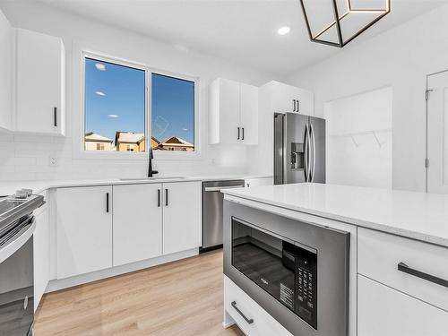 1224 14 Avenue Nw, Edmonton, AB - Indoor Photo Showing Kitchen With Stainless Steel Kitchen With Upgraded Kitchen