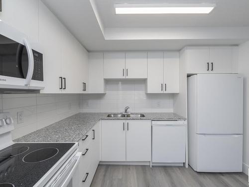 311 9504 182 Street, Edmonton, AB - Indoor Photo Showing Kitchen With Double Sink