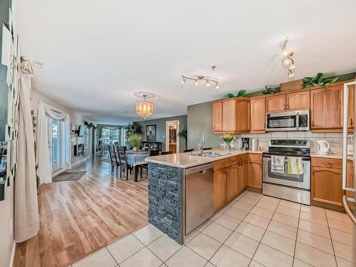 111 530 Hooke Road, Edmonton, AB - Indoor Photo Showing Kitchen With Double Sink