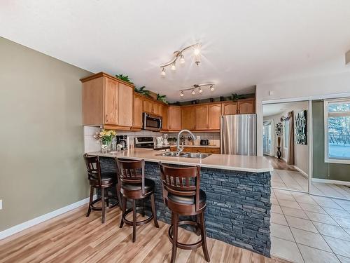 111 530 Hooke Road, Edmonton, AB - Indoor Photo Showing Kitchen With Double Sink