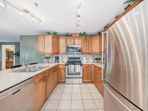 111 530 Hooke Road, Edmonton, AB - Indoor Photo Showing Kitchen With Double Sink