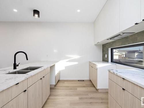 8402 87 Street, Edmonton, AB - Indoor Photo Showing Kitchen With Double Sink