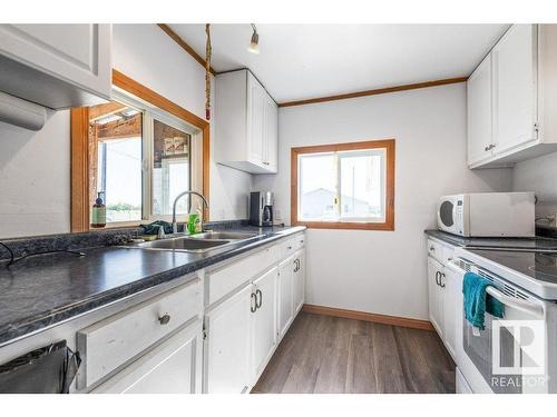 14722 Hwy 28, Rural Smoky Lake County, AB - Indoor Photo Showing Kitchen With Double Sink