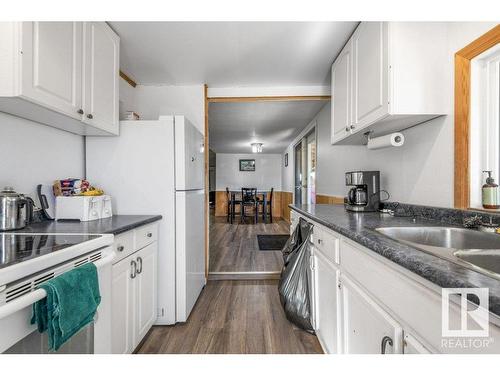 14722 Hwy 28, Rural Smoky Lake County, AB - Indoor Photo Showing Kitchen With Double Sink