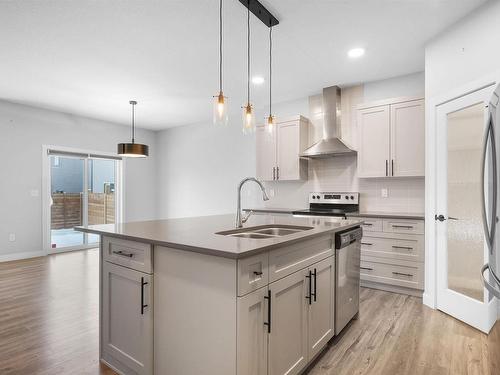 6 Kingsbury Circle, Spruce Grove, AB - Indoor Photo Showing Kitchen With Double Sink With Upgraded Kitchen